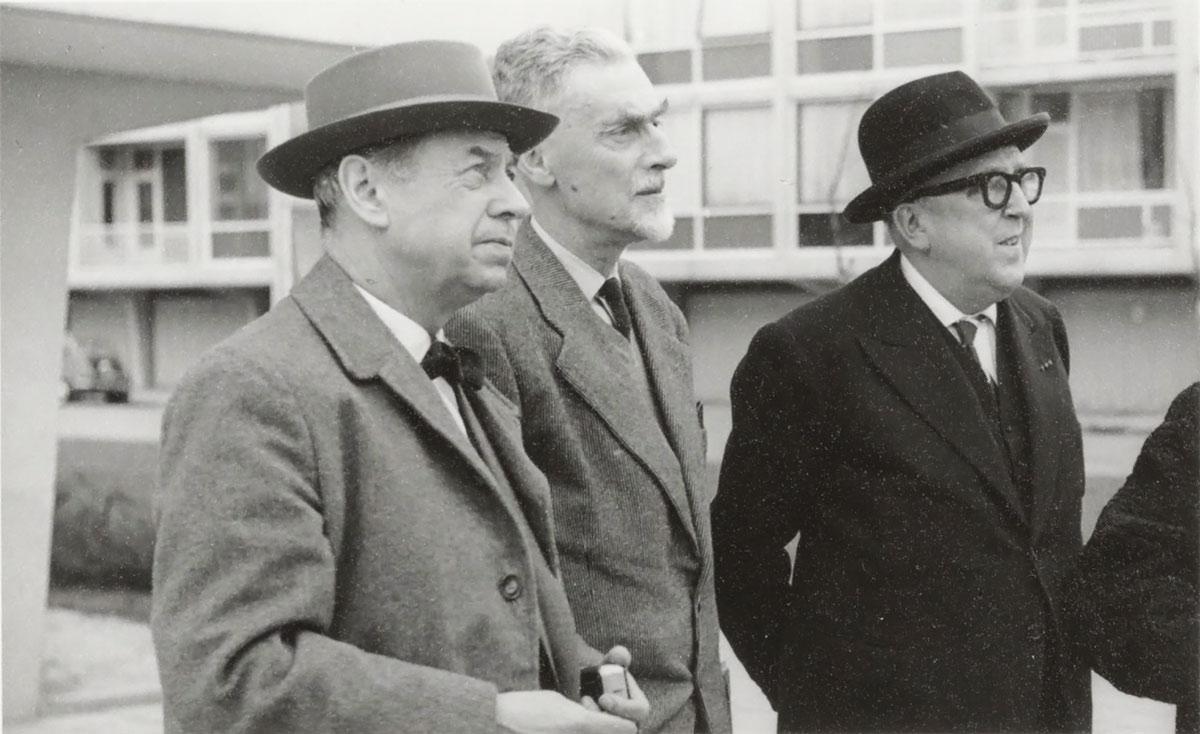 Architect Lau Peters, M.C. Escher and Wolbert J. Vroom at the unveiling of the tile tableau, vintage gelatine silver print, 1960. Collection Kunstmuseum Den Haag