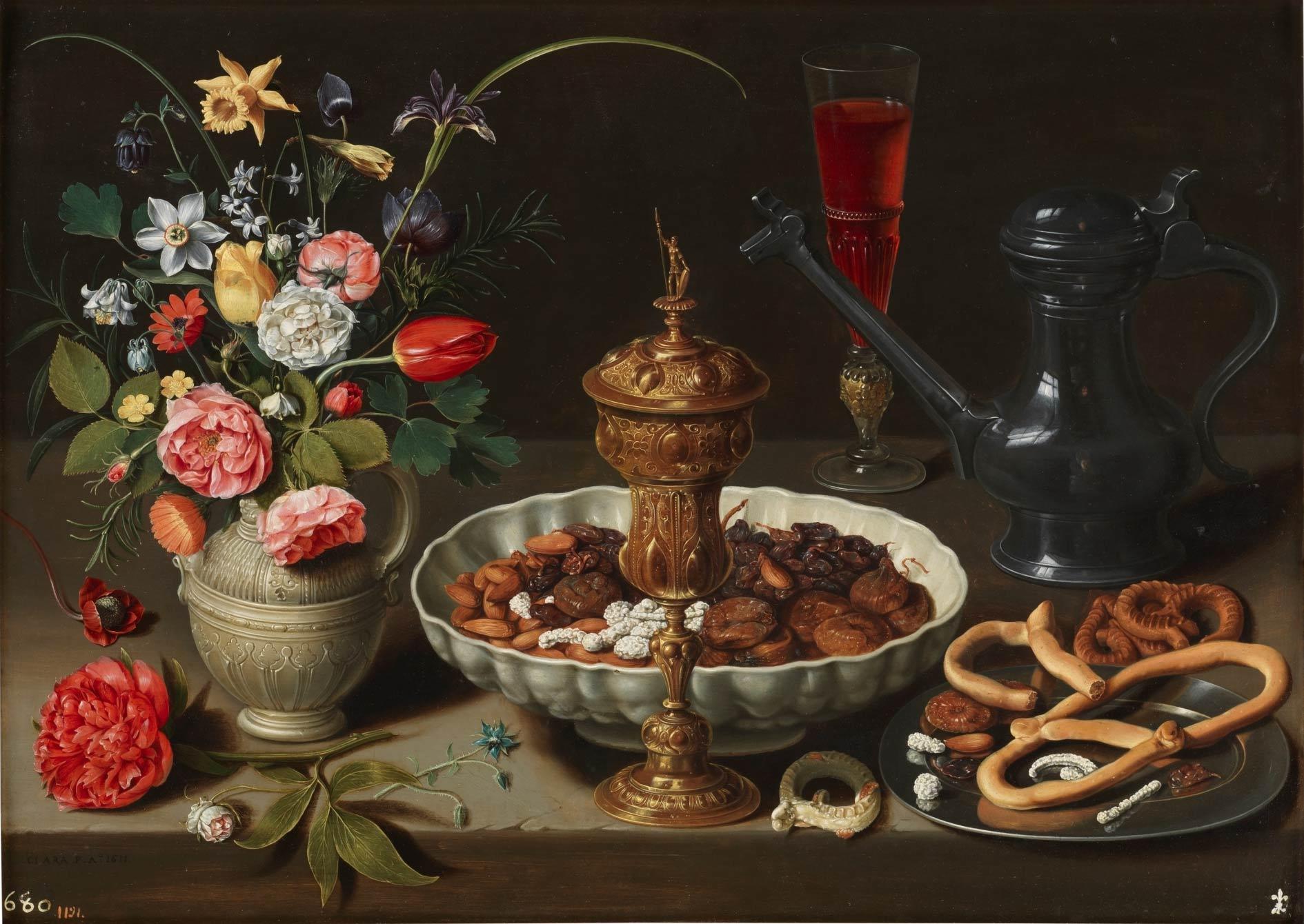 Clara Peeters, Still Life with Flowers, a Silver-gilt Goblet, Dried Fruit, Sweetmeats, Bread sticks, Wine and a Pewter Pitcher, oil on panel, 1611. Collection: Museo del Prado, Madrid