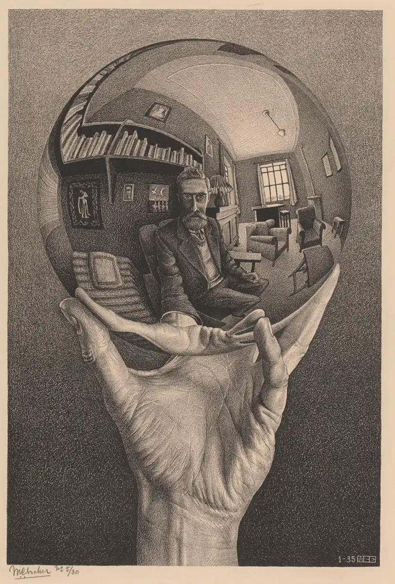 Mano con sfera riflettente